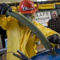 Person suited up in manufacturing class